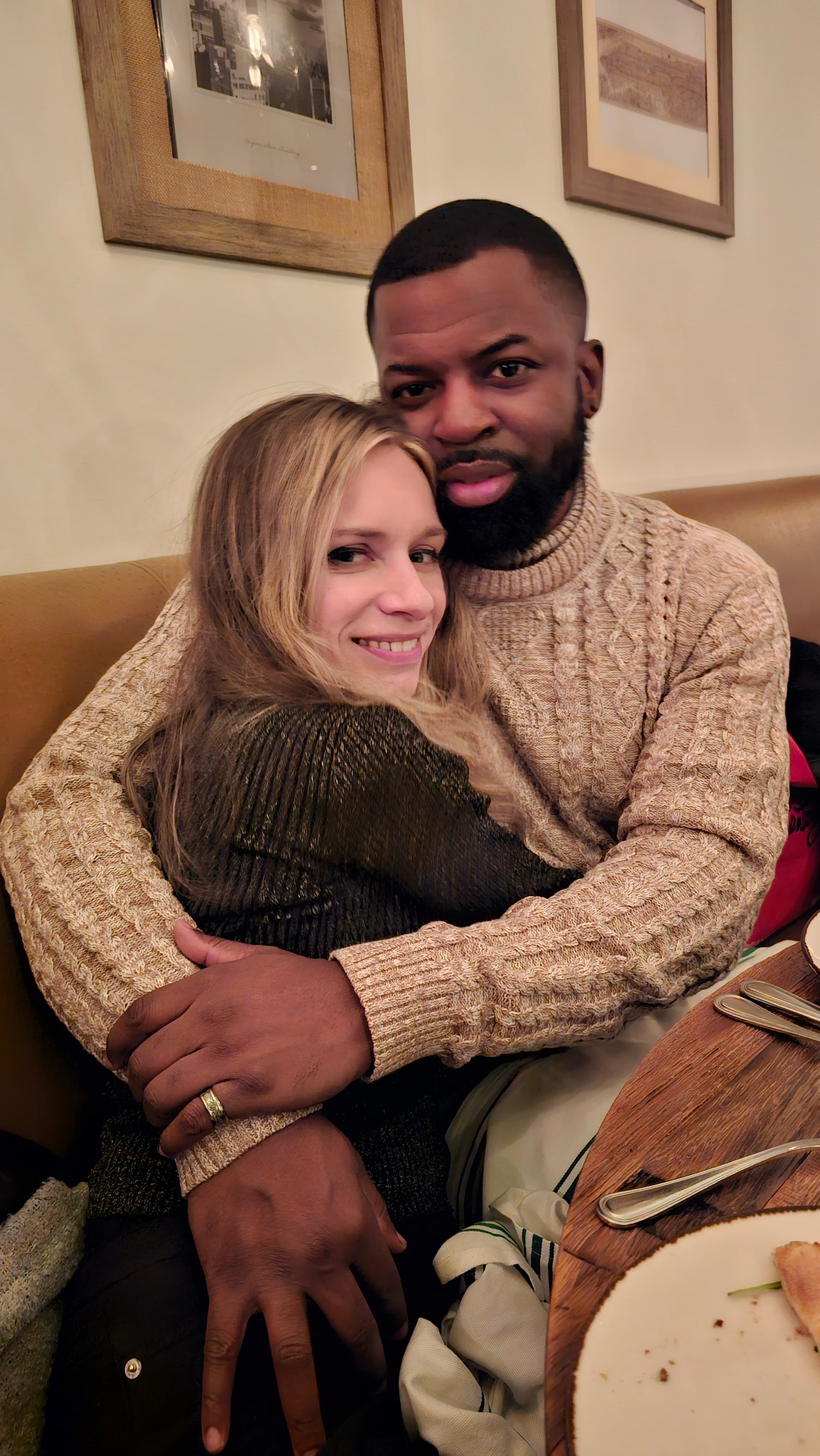 Julie and Robert cuddled up together